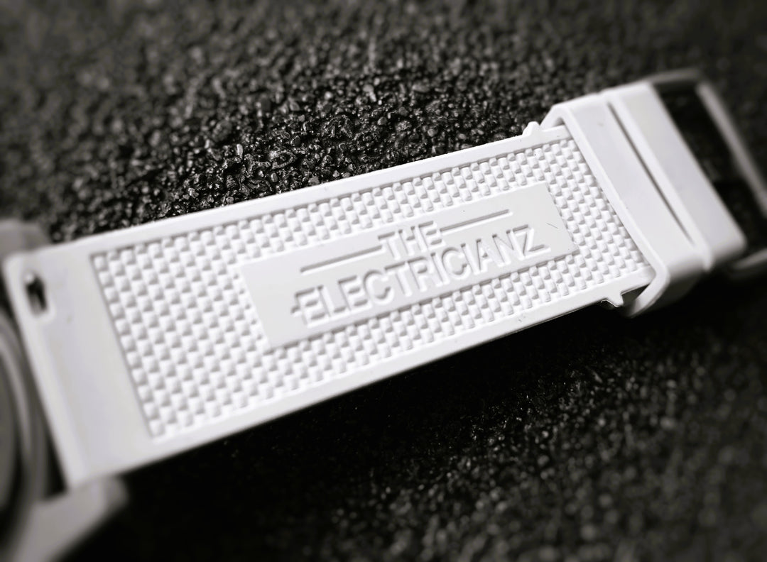 White Embossed Rubber Strap // Silver buckle
